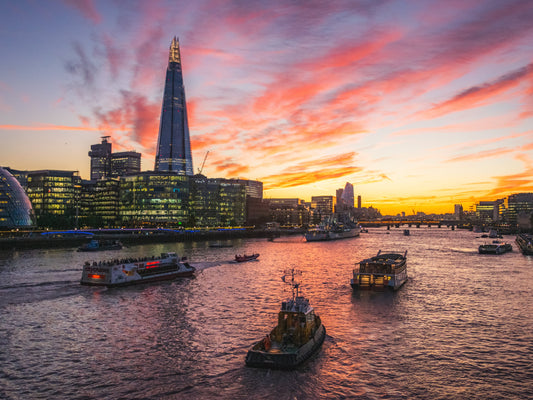 A colourful sunset over the River Thames in London.